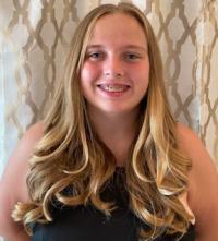 medium closeup photo of Leila smiling